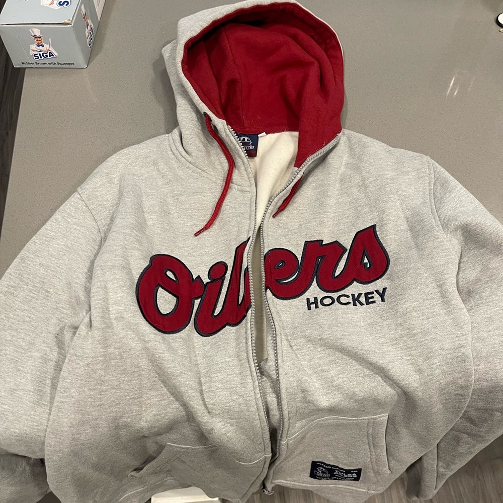 Unworn Tulsa Oilers zip up jacket